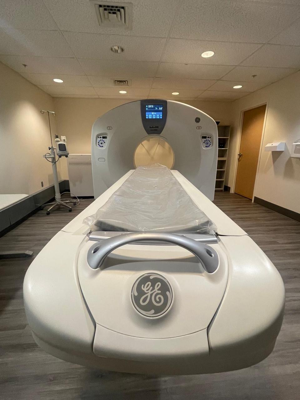 GE imaging system in a finished clinical room.