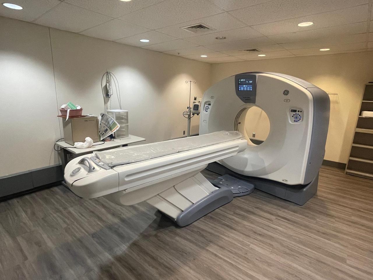 GE CT scanner installed in a clinical imaging room.