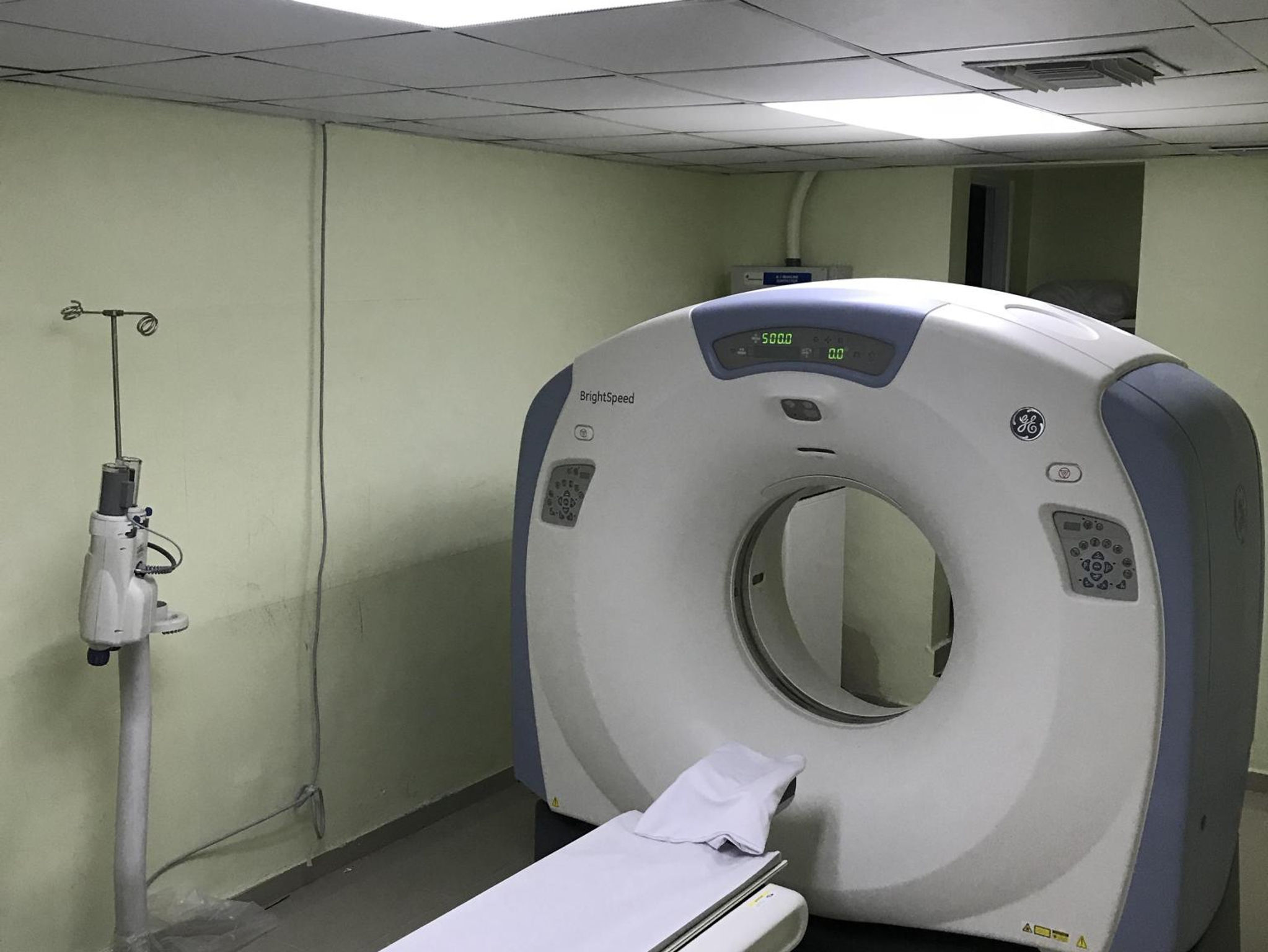 CT scanner in an equipment room for age and condition assessment.
